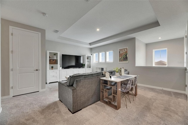 10399 Boyette Brook St, Riverview, FL 33569 - living area with light colored carpet, a tray ceiling, and recessed lighting