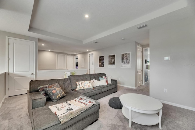 10399 Boyette Brook St, Riverview, FL 33569 - living area featuring light carpet, recessed lighting, and a tray ceiling