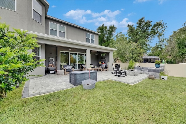 10399 Boyette Brook St, Riverview, FL 33569 - back of house featuring an outdoor living space with a fire pit, stucco siding, a patio, and ceiling fan