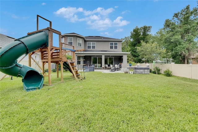 10399 Boyette Brook St, Riverview, FL 33569 - rear view of property with a playground, outdoor lounge area, and a patio