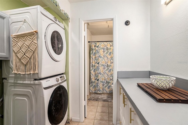 15906 Country Farm Pl, Tampa, FL 33624 - laundry room with stacked washing machine and dryer and light tile patterned floors