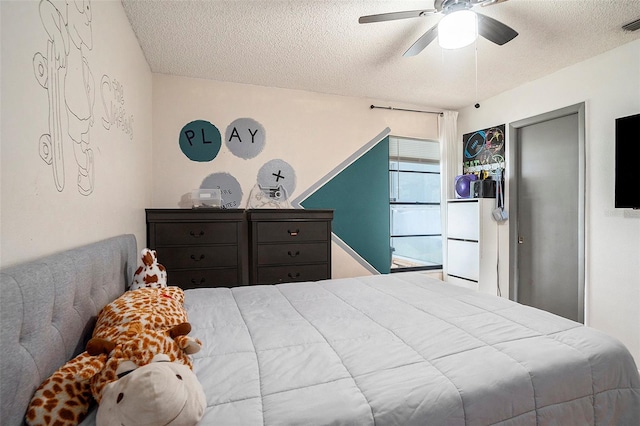 15906 Country Farm Pl, Tampa, FL 33624 - bedroom with a textured ceiling and a ceiling fan