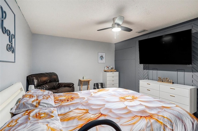 15906 Country Farm Pl, Tampa, FL 33624 - bedroom with a textured ceiling and ceiling fan
