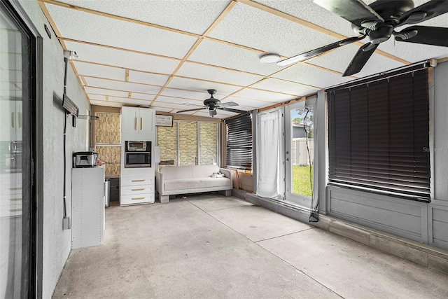15906 Country Farm Pl, Tampa, FL 33624 - unfurnished sunroom with ceiling fan