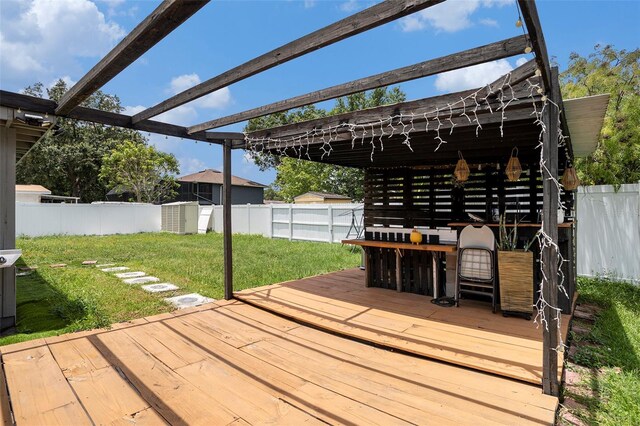 15906 Country Farm Pl, Tampa, FL 33624 - wooden deck with a fenced backyard