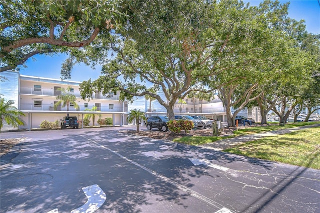 340 Pinellas Bayway S Unit 304, Saint Petersburg, FL 33715 - view of front facade with uncovered parking