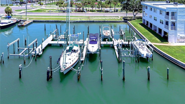 340 Pinellas Bayway S Unit 304, Saint Petersburg, FL 33715 - dock featuring boat lift and a water view