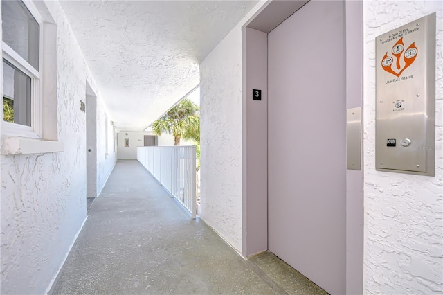 340 Pinellas Bayway S Unit 304, Saint Petersburg, FL 33715 - hall with elevator