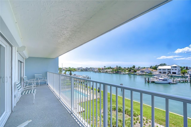 340 Pinellas Bayway S Unit 304, Saint Petersburg, FL 33715 - balcony featuring a water view