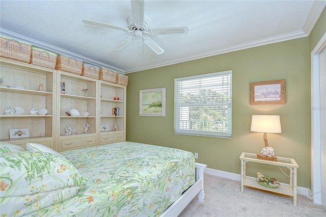 340 Pinellas Bayway S Unit 304, Saint Petersburg, FL 33715 - bedroom featuring light carpet, ornamental molding, and ceiling fan