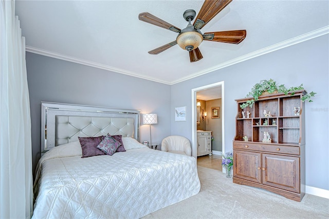 340 Pinellas Bayway S Unit 304, Saint Petersburg, FL 33715 - bedroom featuring crown molding, light colored carpet, connected bathroom, and ceiling fan