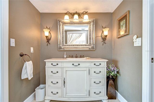 340 Pinellas Bayway S Unit 304, Saint Petersburg, FL 33715 - bathroom featuring vanity and baseboards