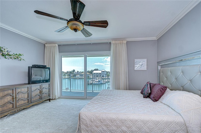 340 Pinellas Bayway S Unit 304, Saint Petersburg, FL 33715 - carpeted bedroom with access to exterior, crown molding, and ceiling fan