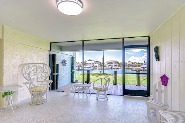 340 Pinellas Bayway S Unit 304, Saint Petersburg, FL 33715 - sunroom featuring a water view