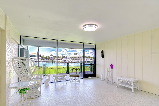 340 Pinellas Bayway S Unit 304, Saint Petersburg, FL 33715 - building lobby with a water view and a wall of windows