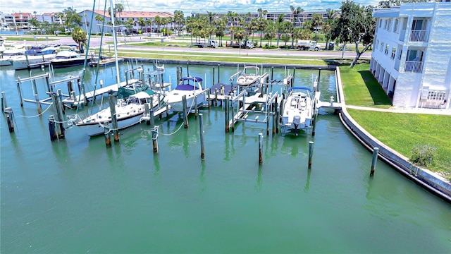 340 Pinellas Bayway S Unit 304, Saint Petersburg, FL 33715 - dock area featuring boat lift, view of marina, and a water view