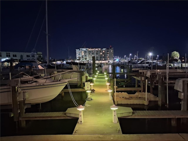 340 Pinellas Bayway S Unit 304, Saint Petersburg, FL 33715 - dock area featuring boat lift