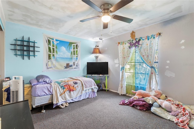 7018 Arbor View Ln, New Port Richey, FL 34653 - carpeted bedroom with multiple windows and ceiling fan