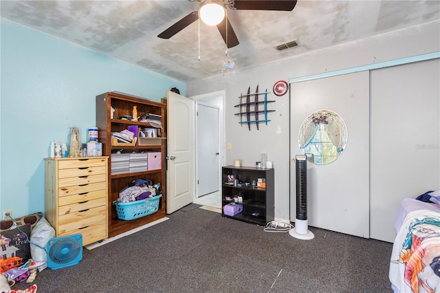 7018 Arbor View Ln, New Port Richey, FL 34653 - carpeted bedroom featuring a ceiling fan and a closet