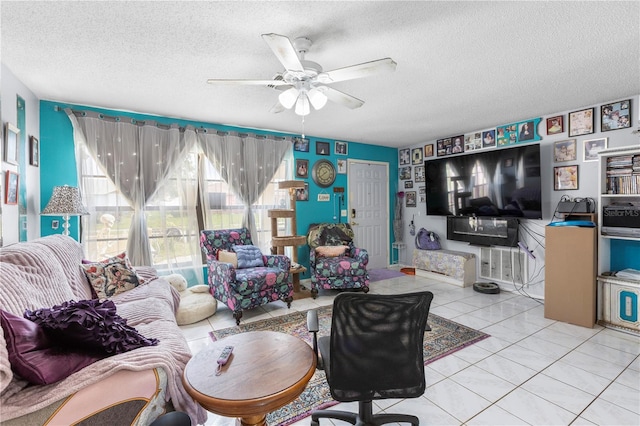 7018 Arbor View Ln, New Port Richey, FL 34653 - living room featuring a textured ceiling, a ceiling fan, and light tile patterned flooring