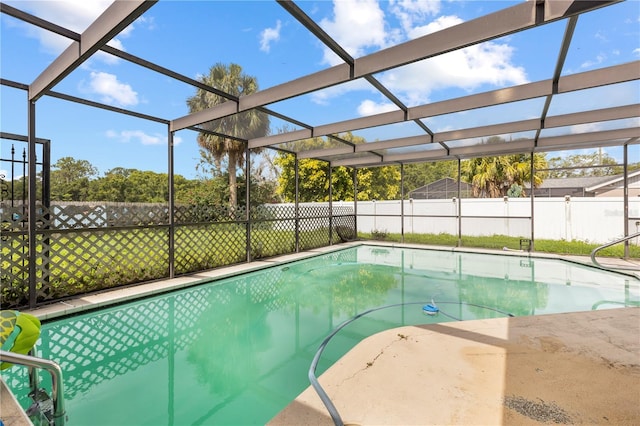 7018 Arbor View Ln, New Port Richey, FL 34653 - view of pool with a fenced backyard, a lanai, and a patio area
