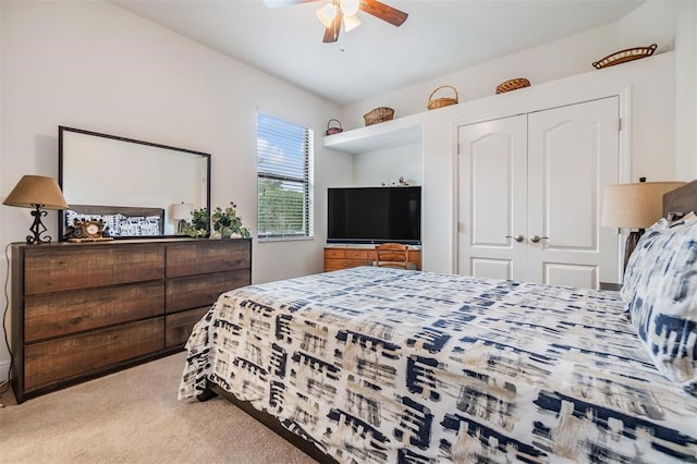 12251 Duckett Ct, Spring Hill, FL 34610 - bedroom with carpet flooring, a closet, and a ceiling fan