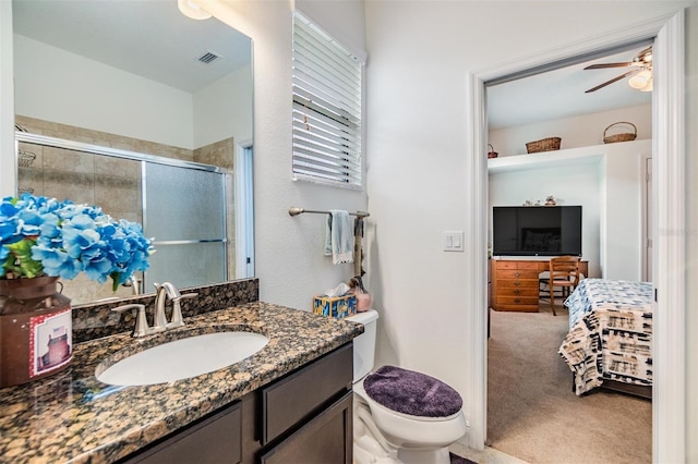 12251 Duckett Ct, Spring Hill, FL 34610 - full bathroom featuring ensuite bath, vanity, a shower stall, and a ceiling fan