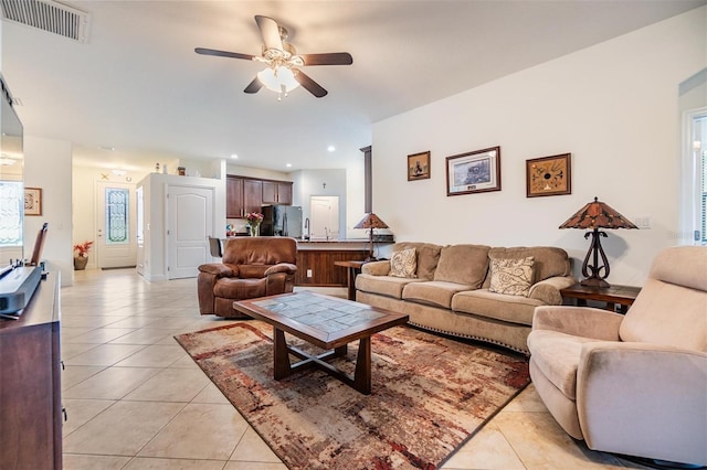 12251 Duckett Ct, Spring Hill, FL 34610 - living room featuring a ceiling fan, light tile patterned floors, and recessed lighting