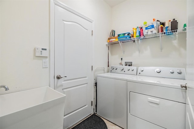 12251 Duckett Ct, Spring Hill, FL 34610 - laundry area featuring separate washer and dryer