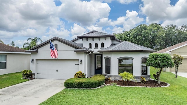 12251 Duckett Ct, Spring Hill, FL 34610 - view of front of home featuring stucco siding, a garage, concrete driveway, a front yard, and a shingled roof