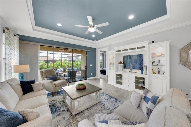 10450 Highland Park Pl, Palmetto, FL 34221 - living area with a tray ceiling, ceiling fan, crown molding, recessed lighting, and beverage cooler