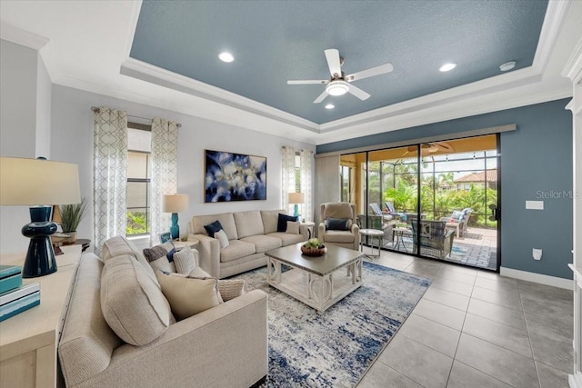 10450 Highland Park Pl, Palmetto, FL 34221 - tiled living area with a raised ceiling, crown molding, a ceiling fan, and recessed lighting