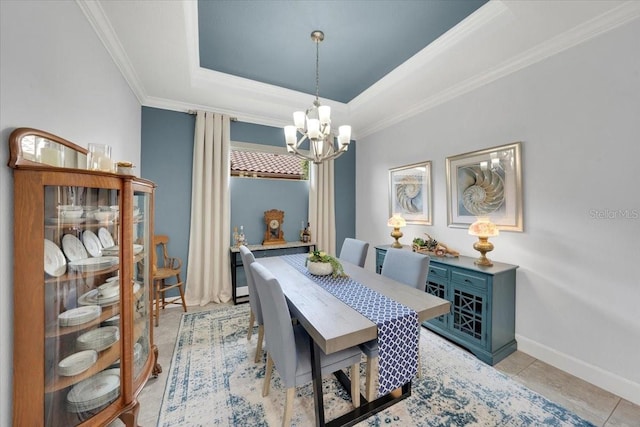 10450 Highland Park Pl, Palmetto, FL 34221 - dining area with a chandelier, crown molding, and a raised ceiling