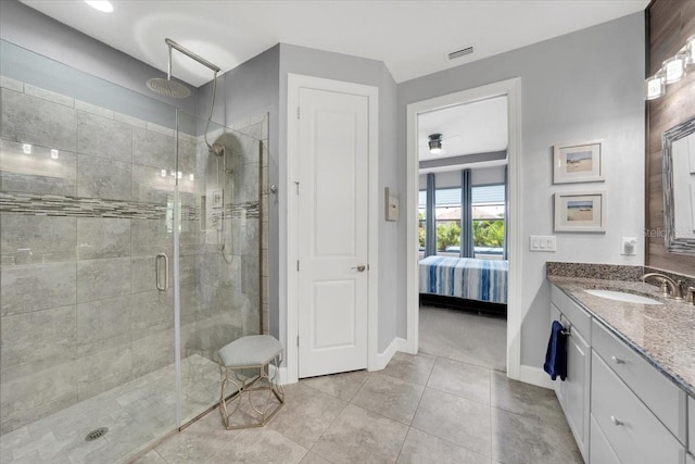 10450 Highland Park Pl, Palmetto, FL 34221 - full bath featuring a stall shower, vanity, ensuite bathroom, and tile patterned flooring