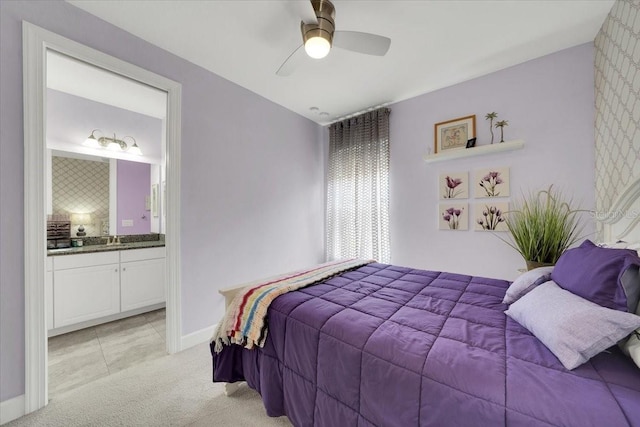 10450 Highland Park Pl, Palmetto, FL 34221 - bedroom with light carpet, connected bathroom, and a ceiling fan