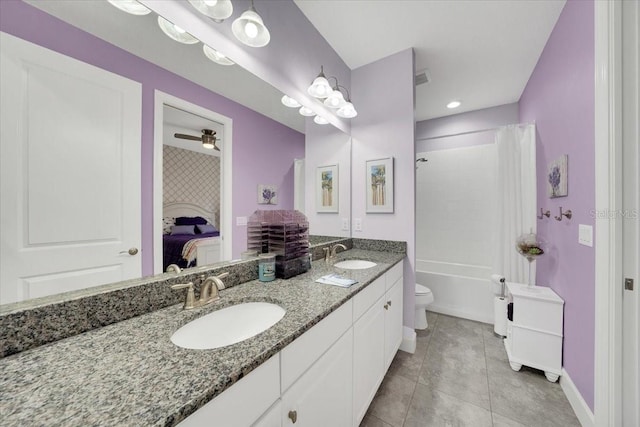 10450 Highland Park Pl, Palmetto, FL 34221 - ensuite bathroom with double vanity, shower / tub combo, and tile patterned flooring