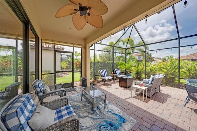 10450 Highland Park Pl, Palmetto, FL 34221 - view of patio / terrace featuring an outdoor living space with a fire pit, a lanai, and a ceiling fan