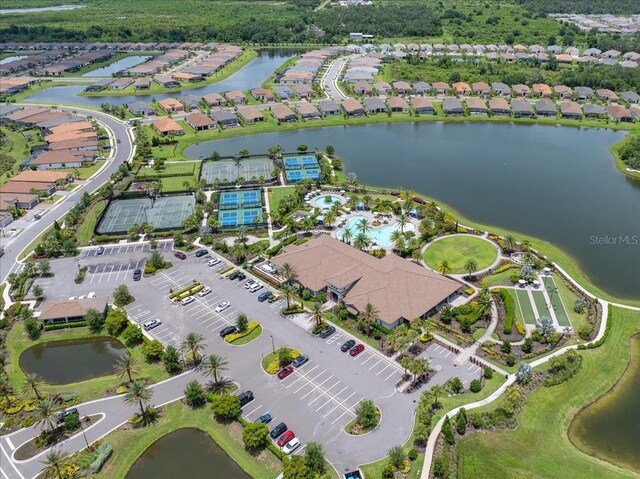 10450 Highland Park Pl, Palmetto, FL 34221 - aerial view of property and surrounding area with a nearby body of water and nearby suburban area