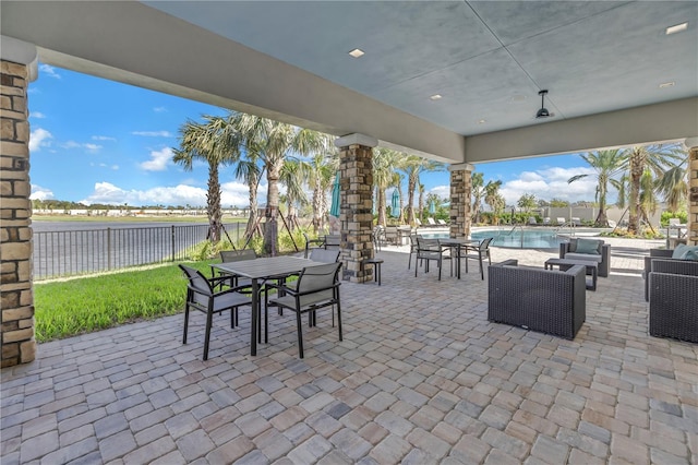 10450 Highland Park Pl, Palmetto, FL 34221 - view of patio with outdoor dining space and a water view