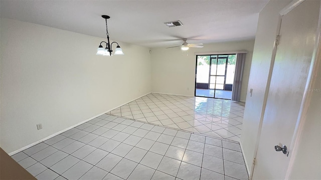 4003 Oak Limb Ct, Tampa, FL 33614 - empty room with light tile patterned flooring, ceiling fan, and a chandelier