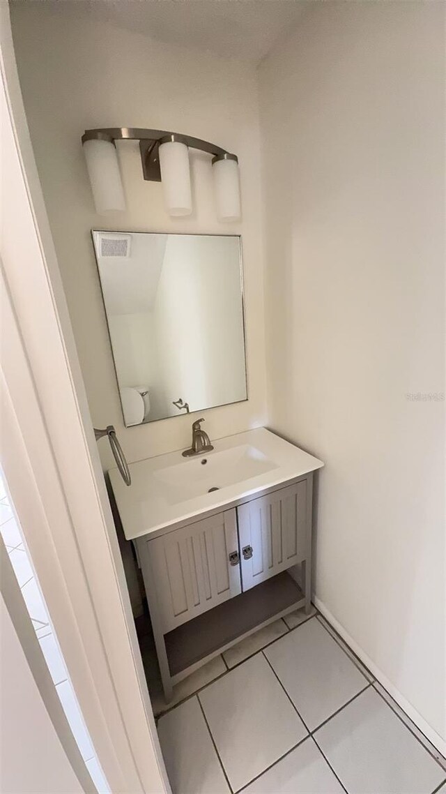 4003 Oak Limb Ct, Tampa, FL 33614 - bathroom featuring vanity and tile patterned floors