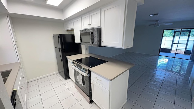 4003 Oak Limb Ct, Tampa, FL 33614 - kitchen featuring black appliances, light tile patterned flooring, open floor plan, and ceiling fan