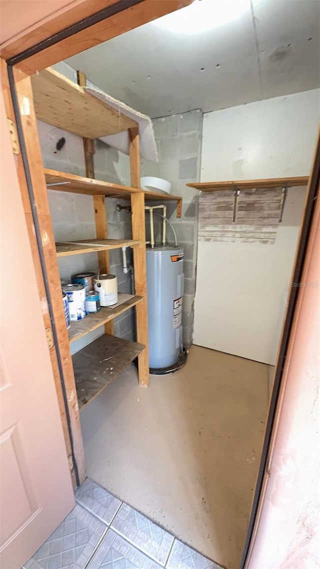 4003 Oak Limb Ct, Tampa, FL 33614 - storage room featuring electric water heater