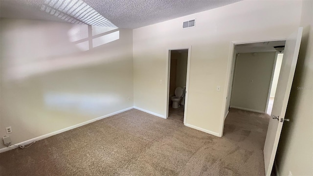 4003 Oak Limb Ct, Tampa, FL 33614 - empty room with carpet floors and a textured ceiling