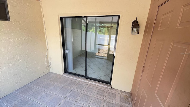 4003 Oak Limb Ct, Tampa, FL 33614 - view of exterior entry featuring stucco siding
