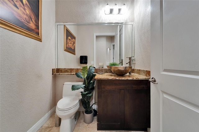 13102 Done Groven Dr, Dover, FL 33527 - bathroom with a textured wall and vanity