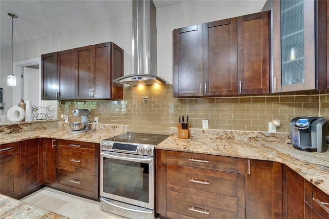 13102 Done Groven Dr, Dover, FL 33527 - kitchen with stainless steel electric range oven, wall chimney range hood, light stone countertops, and pendant lighting