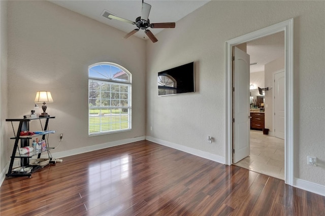 13102 Done Groven Dr, Dover, FL 33527 - unfurnished room featuring a ceiling fan and wood finished floors