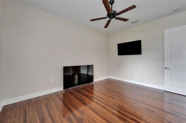 13102 Done Groven Dr, Dover, FL 33527 - unfurnished living room featuring wood finished floors and a ceiling fan