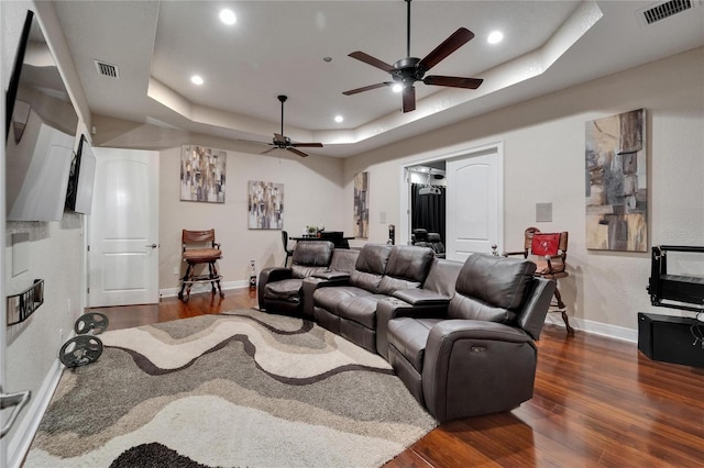 13102 Done Groven Dr, Dover, FL 33527 - home theater with a ceiling fan, a tray ceiling, wood finished floors, and recessed lighting